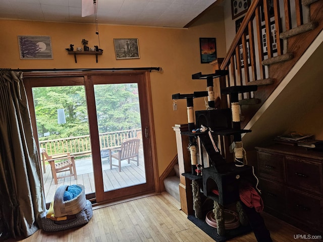 505 Pennsylvania Ave, Ontonagon, MI 49953 - doorway featuring stairs, plenty of natural light, and wood-type flooring