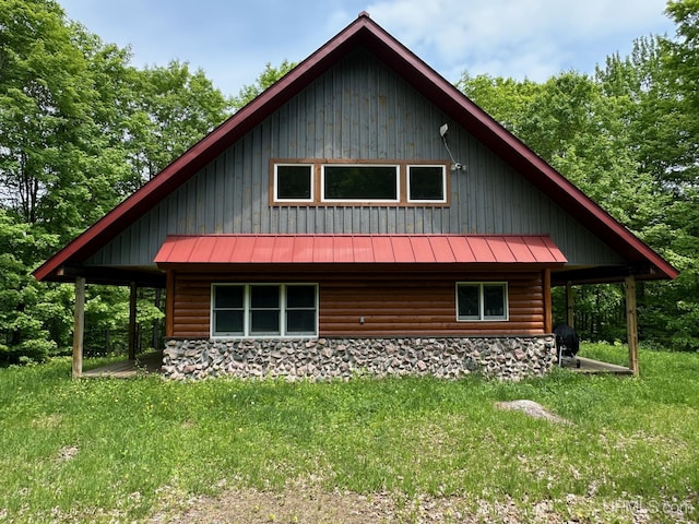 23505 Craig Lake Rd, Michigamme, MI 49861 - view of side of property featuring a standing seam roof and a metal roof