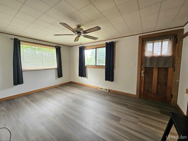 8199 Mill St, Ramsay, MI 49959 - spare room with ceiling fan and wood finished floors