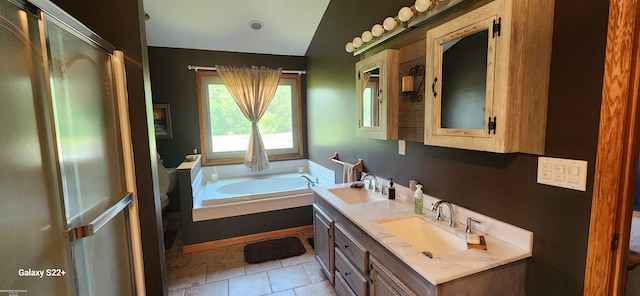 2793 Carina Dr, North Branch, MI 48461 - bathroom featuring lofted ceiling, double vanity, a bath, and tile patterned floors