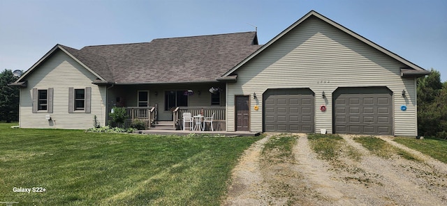 2793 Carina Dr, North Branch, MI 48461 - view of front of home featuring dirt driveway, a porch, an attached garage, a front lawn, and roof with shingles
