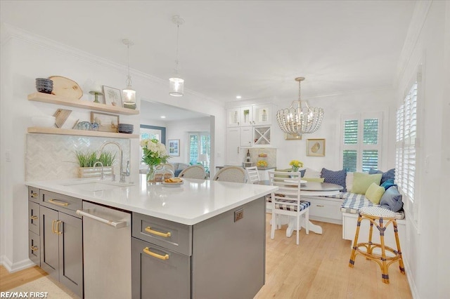 2080 Beaufait Dr, Grosse Pointe Woods, MI 48236 - kitchen featuring dishwasher, gray cabinets, light wood finished floors, open shelves, and crown molding