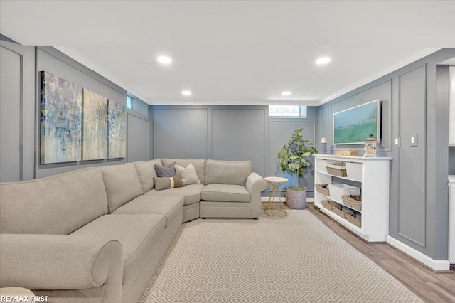 2080 Beaufait Dr, Grosse Pointe Woods, MI 48236 - living area featuring a decorative wall, crown molding, light wood-style floors, and recessed lighting