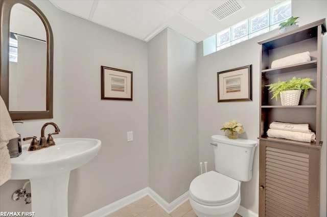 2080 Beaufait Dr, Grosse Pointe Woods, MI 48236 - bathroom featuring toilet and tile patterned floors