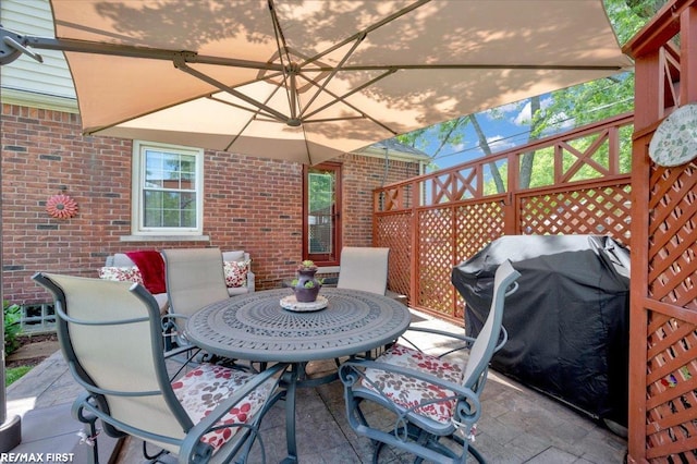 2080 Beaufait Dr, Grosse Pointe Woods, MI 48236 - view of patio / terrace with grilling area and outdoor dining area