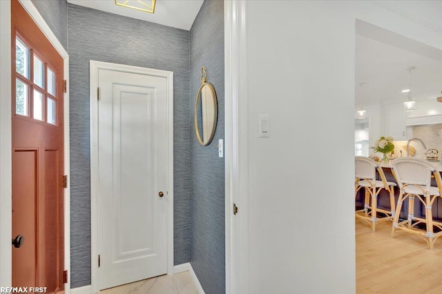 2080 Beaufait Dr, Grosse Pointe Woods, MI 48236 - foyer with baseboards and light wood-style floors