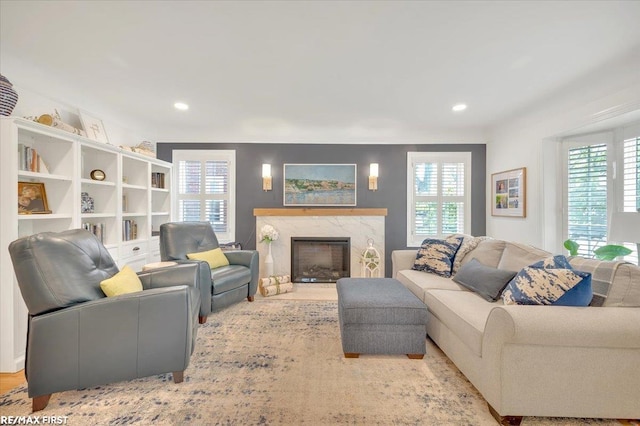2080 Beaufait Dr, Grosse Pointe Woods, MI 48236 - living room featuring plenty of natural light, a fireplace, recessed lighting, and wood finished floors