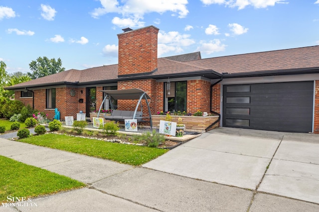1389 Bedford Rd, Grosse Pointe Park, MI 48230 - single story home with driveway, brick siding, a garage, a chimney, and roof with shingles