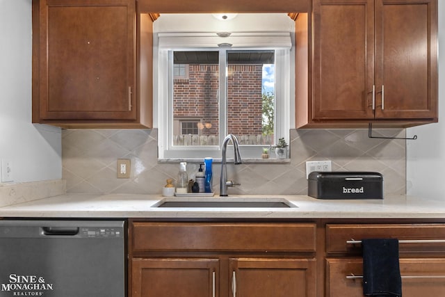 1389 Bedford Rd, Grosse Pointe Park, MI 48230 - kitchen with dishwashing machine, tasteful backsplash, and brown cabinets