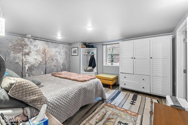 1389 Bedford Rd, Grosse Pointe Park, MI 48230 - bedroom featuring wood finished floors and a closet