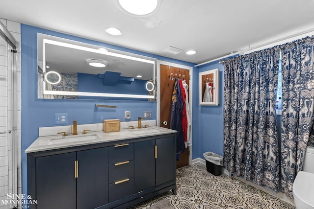 1389 Bedford Rd, Grosse Pointe Park, MI 48230 - bathroom featuring double vanity, tile patterned floors, and a shower with curtain