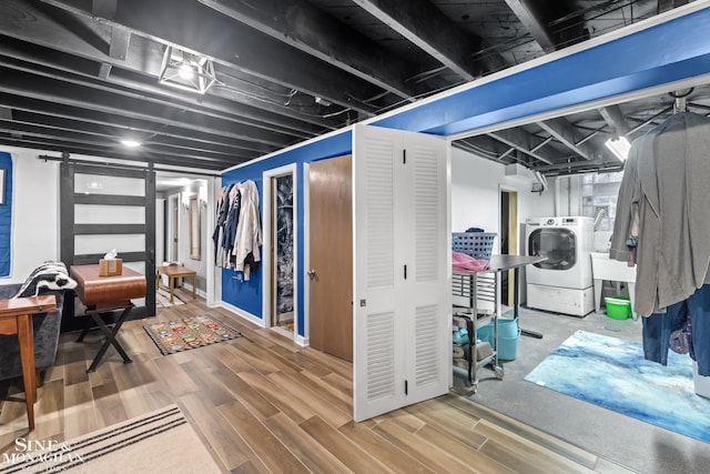 1389 Bedford Rd, Grosse Pointe Park, MI 48230 - finished below grade area featuring wood finished floors and washing machine and dryer