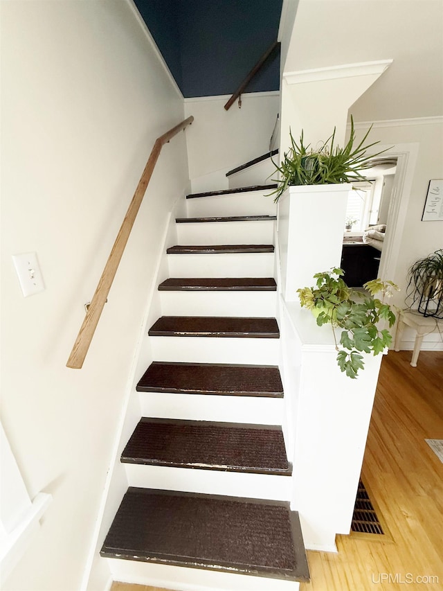 401 White St, Hancock, MI 49930 - stairs featuring wood finished floors