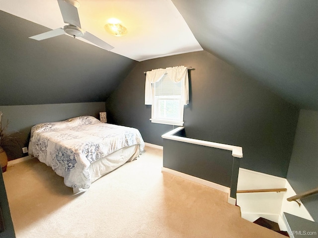 401 White St, Hancock, MI 49930 - carpeted bedroom featuring vaulted ceiling and baseboards