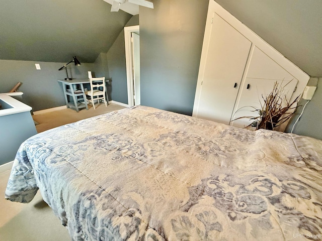 401 White St, Hancock, MI 49930 - carpeted bedroom with vaulted ceiling and baseboards
