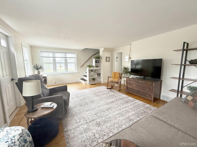 401 White St, Hancock, MI 49930 - living room featuring stairway and wood finished floors