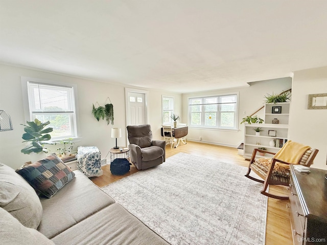 401 White St, Hancock, MI 49930 - living room featuring light wood finished floors