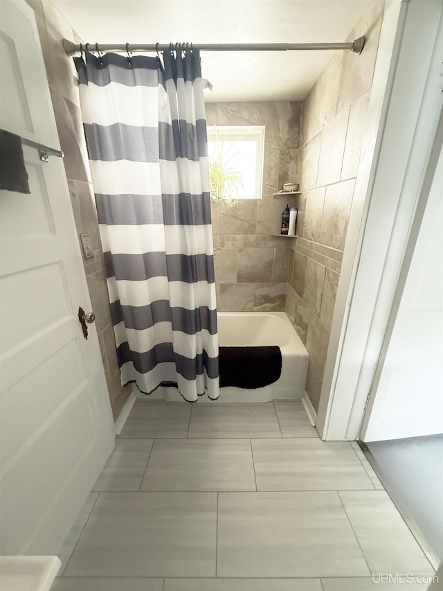 401 White St, Hancock, MI 49930 - bathroom featuring shower / tub combo and tile patterned floors