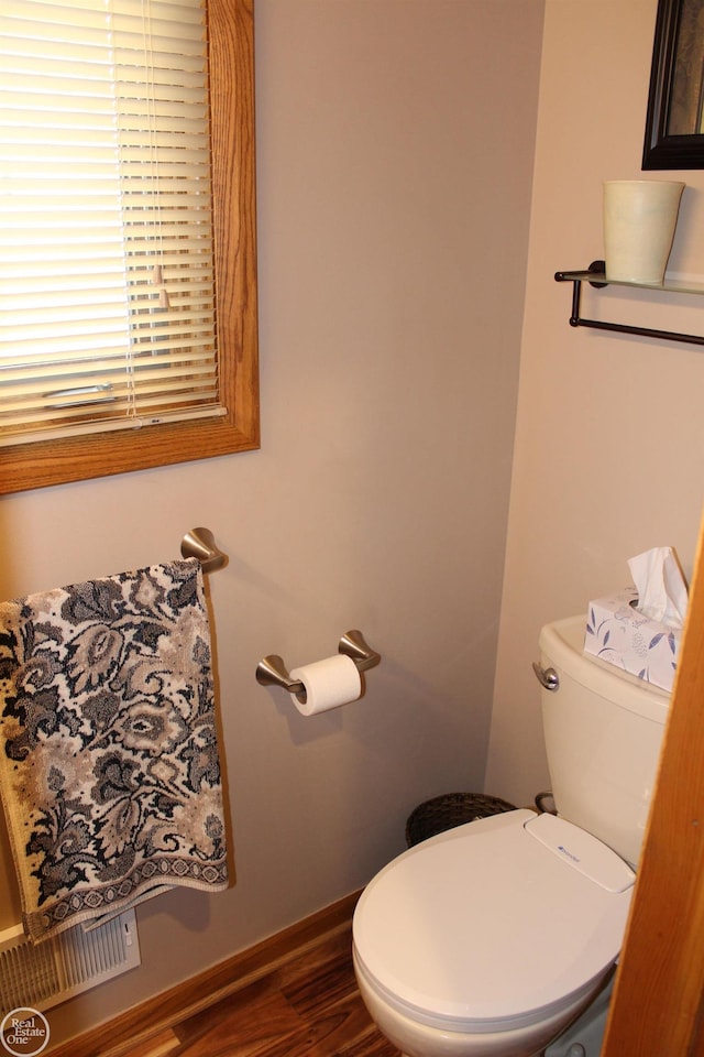 43980 Boulder Rd, Clinton Township, MI 48038 - bathroom with toilet and wood finished floors