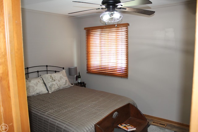 43980 Boulder Rd, Clinton Township, MI 48038 - bedroom featuring ornamental molding, ceiling fan, and wood finished floors