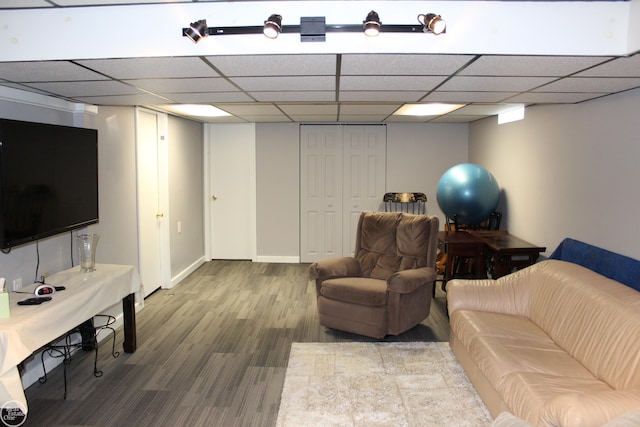 43980 Boulder Rd, Clinton Township, MI 48038 - living area featuring wood finished floors and a paneled ceiling