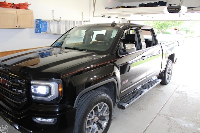 43980 Boulder Rd, Clinton Township, MI 48038 - garage with a garage door opener