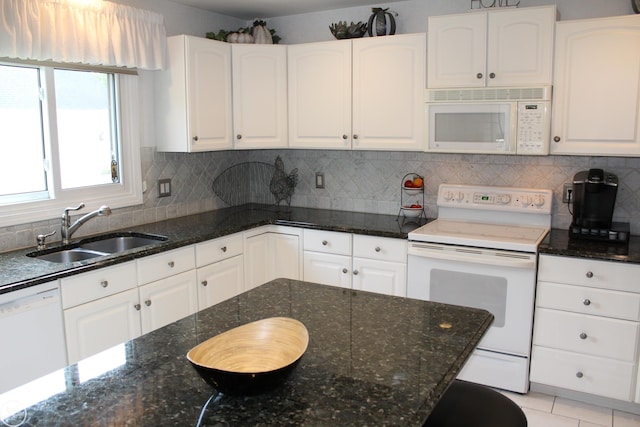 54640 Burlington Dr, Shelby Twp, MI 48315 - kitchen with white appliances, white cabinets, backsplash, and dark stone countertops