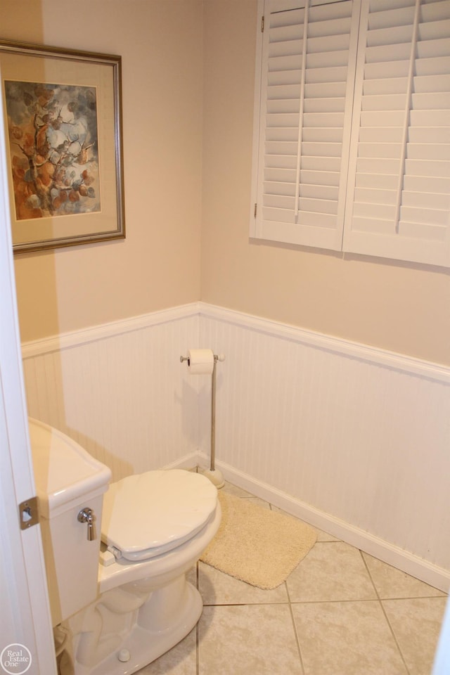 54640 Burlington Dr, Shelby Twp, MI 48315 - bathroom with a wainscoted wall and tile patterned floors