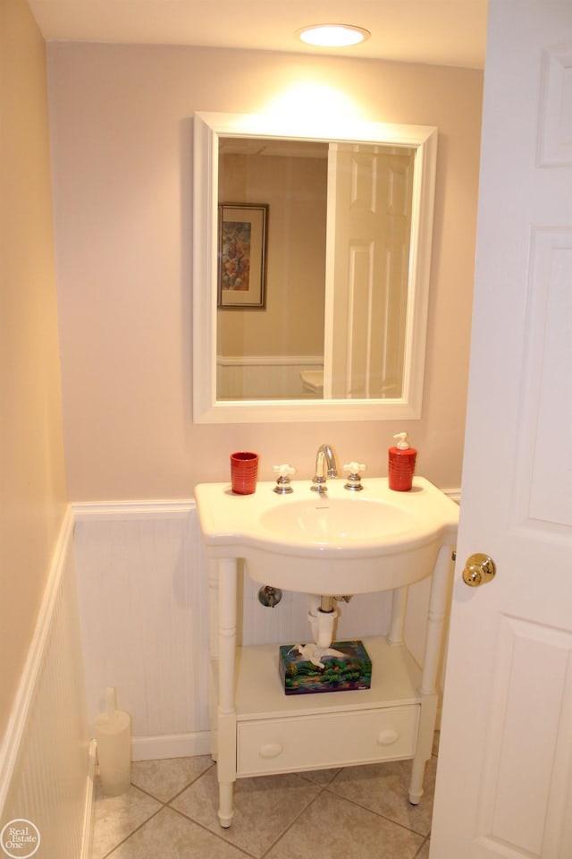 54640 Burlington Dr, Shelby Twp, MI 48315 - bathroom with a wainscoted wall and tile patterned floors