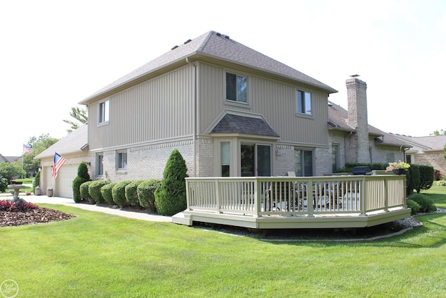 54640 Burlington Dr, Shelby Twp, MI 48315 - rear view of house featuring brick siding, an attached garage, a deck, and a yard
