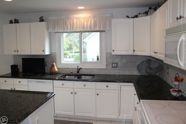 54640 Burlington Dr, Shelby Twp, MI 48315 - kitchen with white appliances, dark stone countertops, white cabinetry, and recessed lighting