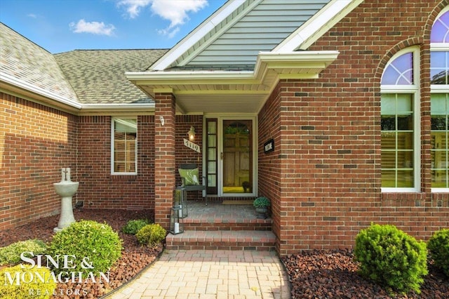 7119 Simons St, Lexington, MI 48450 - doorway to property featuring brick siding