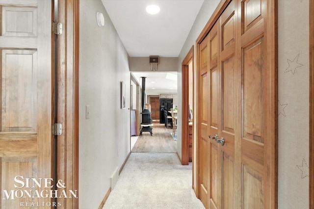 7119 Simons St, Lexington, MI 48450 - hallway with light carpet and baseboards