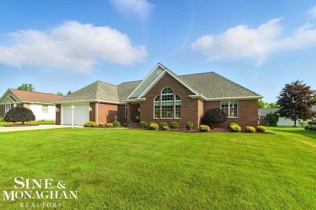 7119 Simons St, Lexington, MI 48450 - view of front of property with brick siding, concrete driveway, a garage, a front lawn, and roof with shingles