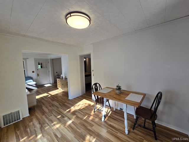816 W Bluff St, Marquette, MI 49855 - dining space featuring wood finished floors