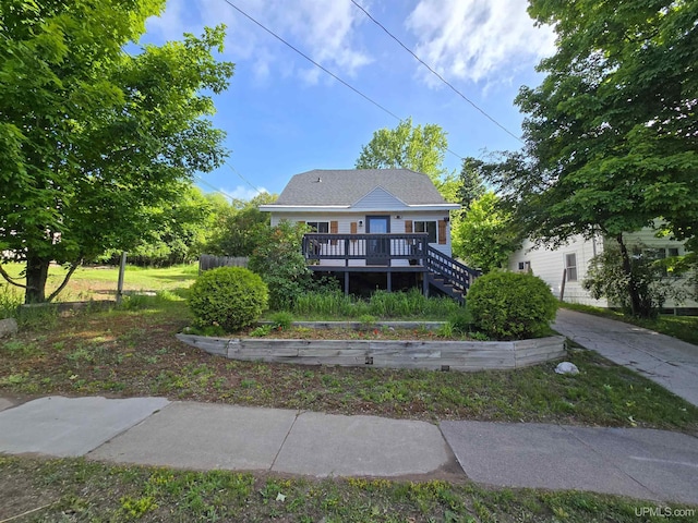 816 W Bluff St, Marquette, MI 49855 - rear view of property featuring a wooden deck and stairs
