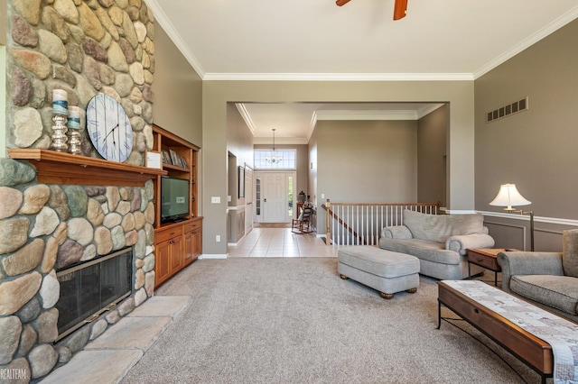 14329 Barton Dr, Washington Twp, MI 48094 - living area with ornamental molding, light carpet, a stone fireplace, and ceiling fan