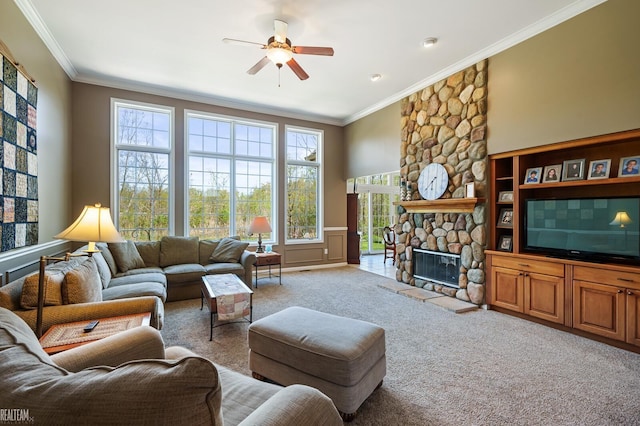 14329 Barton Dr, Washington Twp, MI 48094 - living area featuring carpet, crown molding, healthy amount of natural light, ceiling fan, and a stone fireplace