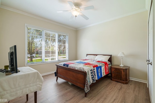 14329 Barton Dr, Washington Twp, MI 48094 - bedroom with wood finished floors, crown molding, and a ceiling fan