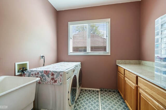 14329 Barton Dr, Washington Twp, MI 48094 - laundry room featuring independent washer and dryer and cabinet space