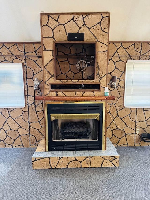 4110 Oak Ridge Dr, Harrison, MI 48625 - detailed view of carpet and a fireplace with raised hearth