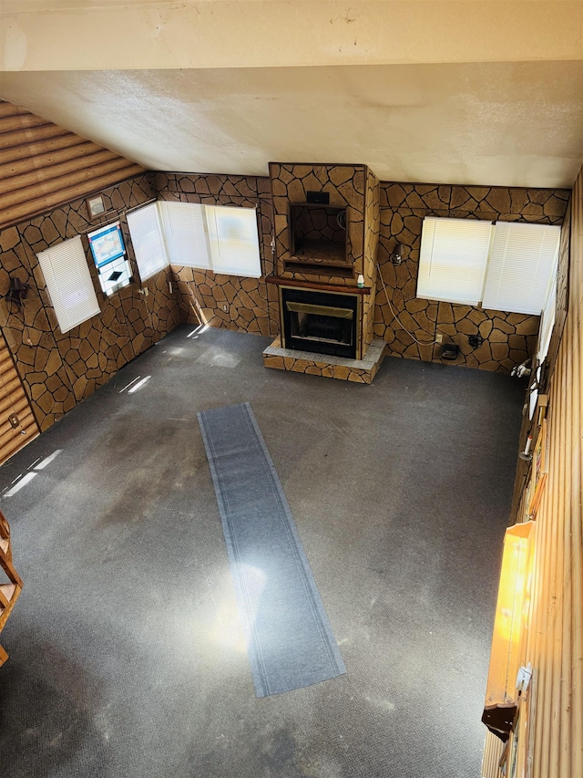 4110 Oak Ridge Dr, Harrison, MI 48625 - unfurnished living room featuring carpet and a large fireplace