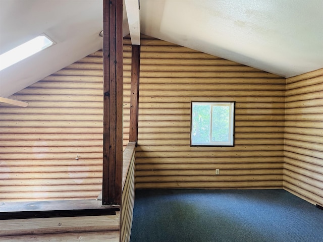 4110 Oak Ridge Dr, Harrison, MI 48625 - additional living space featuring log walls, vaulted ceiling, and carpet floors