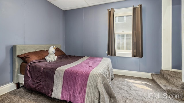 605 S 9th St, Escanaba, MI 49829 - carpeted bedroom featuring baseboards
