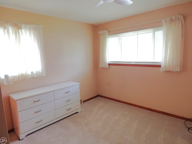 8508 Darlene St, Warren, MI 48093 - unfurnished bedroom featuring light carpet and a ceiling fan