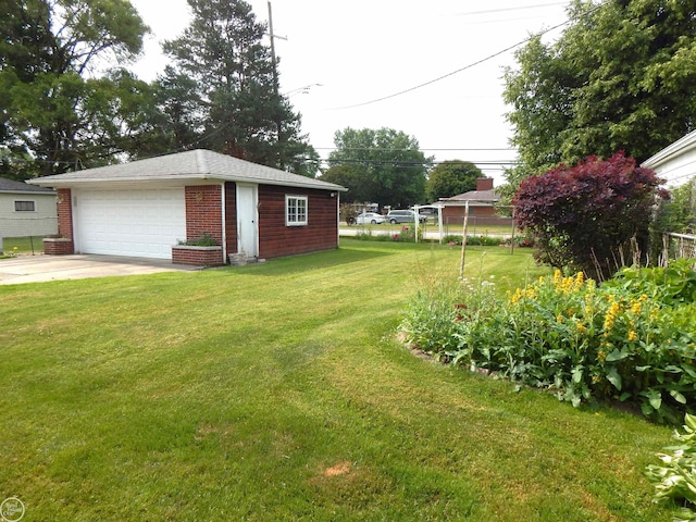 8508 Darlene St, Warren, MI 48093 - view of yard featuring an outdoor structure and a garage