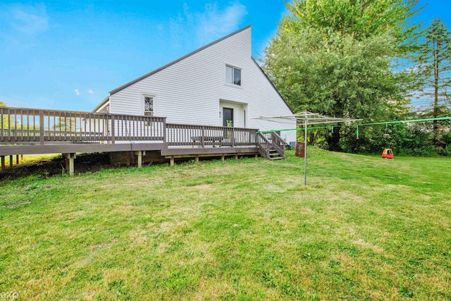 77280 Coon Creek Rd, Armada, MI 48005 - rear view of house featuring a deck and a lawn