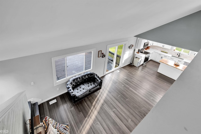 77280 Coon Creek Rd, Armada, MI 48005 - living room with dark wood-style flooring and baseboards