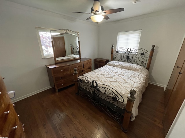 11485 Racine St, Warren, MI 48093 - bedroom with dark wood-style floors, multiple windows, ceiling fan, and ornamental molding