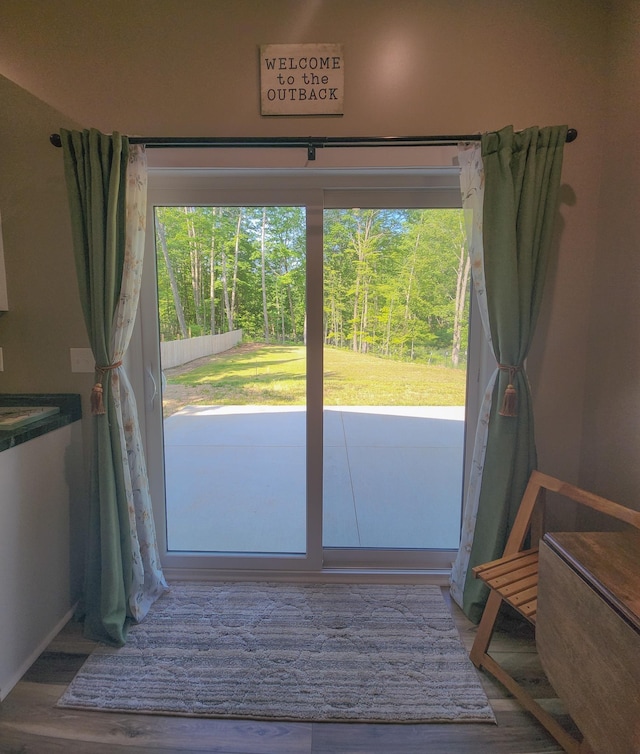 11339 Alpine Dr, Lake, MI 48632 - entryway with wood finished floors and baseboards